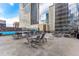 Community pool deck with lounge seating and grill at 1020 15Th St # 35N, Denver, CO 80202