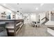Open basement with a custom bar area, dining space, and versatile layout for entertaining at 4009 Manorbrier Cir, Castle Rock, CO 80104