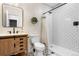 Stylish bathroom featuring a modern vanity, patterned floor tiles, and a subway tile shower at 4009 Manorbrier Cir, Castle Rock, CO 80104