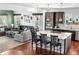 Open-concept kitchen with island seating and a view of the living room at 4009 Manorbrier Cir, Castle Rock, CO 80104