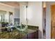 Contemporary bathroom with a glass vessel sink, granite countertop, and modern fixtures at 401 Highway 72, Golden, CO 80403