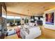 Open-concept living room boasts natural light, hardwood floors and stunning mountain views at 401 Highway 72, Golden, CO 80403