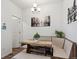 Bright dining area featuring a cozy built-in bench, wooden table, and elegant chandelier at 18304 Caffey Dr, Parker, CO 80134