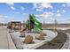 Community playground with slide, climbing structures, and benches for parents to relax at 18304 Caffey Dr, Parker, CO 80134