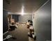 View of the basement with an area rug and view of another room at 841 S 6Th Ave, Brighton, CO 80601