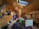 A recreation room with a wooden ceiling, skylight, and various taxidermied animal heads throughout at 841 S 6Th Ave, Brighton, CO 80601