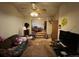 View of the living room with stairs leading into bedroom area at 841 S 6Th Ave, Brighton, CO 80601