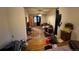 View of the cluttered living room and bedroom area at 841 S 6Th Ave, Brighton, CO 80601