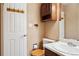 Cozy bathroom with wooden accents and classic fixtures at 27124 Sun Ridge Dr, Evergreen, CO 80439