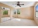 Bright bedroom with mirrored closet doors offering ample storage and natural light at 27124 Sun Ridge Dr, Evergreen, CO 80439