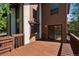 Exterior view of a wooden deck with a fenced gate, enhancing privacy and security at 27124 Sun Ridge Dr, Evergreen, CO 80439