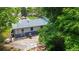 Charming single-story home with a stone patio perfect for outdoor entertaining at 3317 W Belmont Ave, Littleton, CO 80123