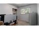 Bright bedroom with a large window, gray walls, and ample space at 3317 W Belmont Ave, Littleton, CO 80123