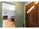 View from entryway into the living room showing hardwood floors at 3317 W Belmont Ave, Littleton, CO 80123