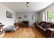 Spacious living room offering great natural light and a cozy atmosphere at 3317 W Belmont Ave, Littleton, CO 80123