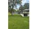 Park landscape with playground, picnic area, shady trees and plenty of green space to enjoy at 3317 W Belmont Ave, Littleton, CO 80123