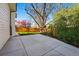 Spacious backyard with a large patio and basketball hoop, perfect for outdoor activities and recreation at 6787 E Exposition Ave, Denver, CO 80224