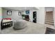 Cozy basement featuring a large sofa and comfy seating area, perfect for relaxing and entertaining at 6787 E Exposition Ave, Denver, CO 80224