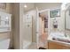 Well-lit bathroom with a walk-in shower and a modern vanity, providing a clean and functional space at 3358 Castle Butte Dr, Castle Rock, CO 80109
