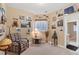 Charming, decorated room with unique decor and natural light, perfect for relaxation and hobbies at 3358 Castle Butte Dr, Castle Rock, CO 80109