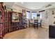 This is a spacious wine cellar with custom shelving and tile floors, perfect for entertaining at 3358 Castle Butte Dr, Castle Rock, CO 80109