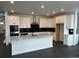 Spacious kitchen with marble countertops, stainless steel appliances and a large kitchen island at 16529 Black Rose Cir, Parker, CO 80134