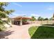 Backyard patio with covered entertainment area at 1249 S Irving St, Denver, CO 80219
