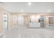 Open basement area with modern flooring and kitchenette at 1249 S Irving St, Denver, CO 80219
