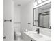 Bathroom with white vanity and black faucet at 1249 S Irving St, Denver, CO 80219