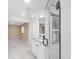 Bathroom featuring marble countertop and tiled glass shower at 1249 S Irving St, Denver, CO 80219