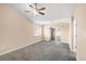 Carpeted bedroom with a ceiling fan, closet, and sliding glass doors at 1249 S Irving St, Denver, CO 80219