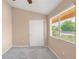 Bedroom with large window and a double door closet at 1249 S Irving St, Denver, CO 80219