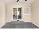 Sun room with large glass door and a wall vent at 1249 S Irving St, Denver, CO 80219