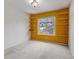 Bedroom with wall shelving units for storage and big bright windows at 353 Oxbow Dr, Monument, CO 80132