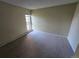 Bedroom with neutral carpet, window, and fresh paint, ready for personalization at 850 W Moorhead Cir # 3F, Boulder, CO 80305