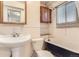 Cozy bathroom featuring classic fixtures, and a claw-foot tub at 4151 Zenobia St, Denver, CO 80212