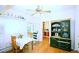 Cozy dining room with a table, built in cabinet, and hardwood floors at 4151 Zenobia St, Denver, CO 80212