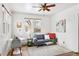 Comfortable living room with hardwood floors, and neutral-toned furniture at 4151 Zenobia St, Denver, CO 80212