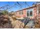 Landscaped backyard with patio and rock garden at 851 Lonewolf Cir, Lochbuie, CO 80603