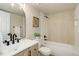 Bathroom with modern fixtures, sleek tiling, and vanity with sink at 17605 Ponderosa Ave, Parker, CO 80134