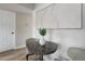 Small dining area features a round table with seating for two and modern decor at 17605 Ponderosa Ave, Parker, CO 80134