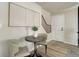Entryway with wood-look flooring, staircase, and decor at 17605 Ponderosa Ave, Parker, CO 80134