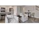 Cozy living room showcases an open concept layout to the modern kitchen at 17605 Ponderosa Ave, Parker, CO 80134