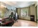 Office space with a forest themed mural, a view of the neighborhood, and dark trim at 8979 Field St # 27, Westminster, CO 80021