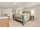 Tranquil bedroom featuring a charming horse-themed bed frame and soft lighting at 811 Panorama Dr, Elizabeth, CO 80107