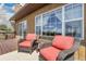 Relaxing outdoor deck with comfortable seating and a view of the surrounding landscape at 811 Panorama Dr, Elizabeth, CO 80107