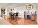 Dining area with a table, seating, and a buffet-style counter with appliances at 811 Panorama Dr, Elizabeth, CO 80107