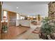 Welcoming entryway featuring brick flooring and a view into the kitchen and living spaces at 811 Panorama Dr, Elizabeth, CO 80107