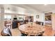 Spacious living room boasts a stone fireplace, and hardwood floors at 811 Panorama Dr, Elizabeth, CO 80107