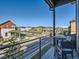 Balcony view of the neighborhood with mountain views in the distance at 805 Promenade Dr, Superior, CO 80027